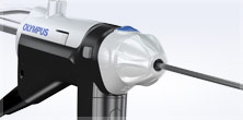 Hand-held automatic debrider with laparoscopic instrument