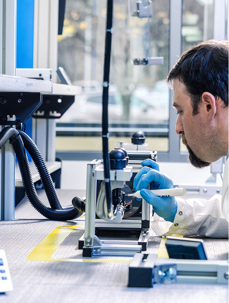 Technician working with equipment