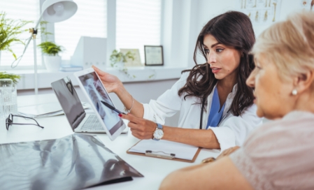 HCP reviewing x-ray.